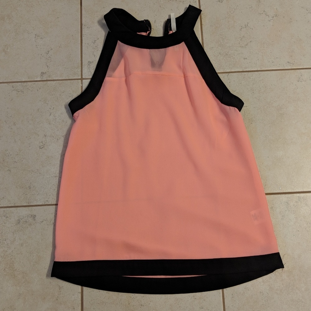 Peach and black top